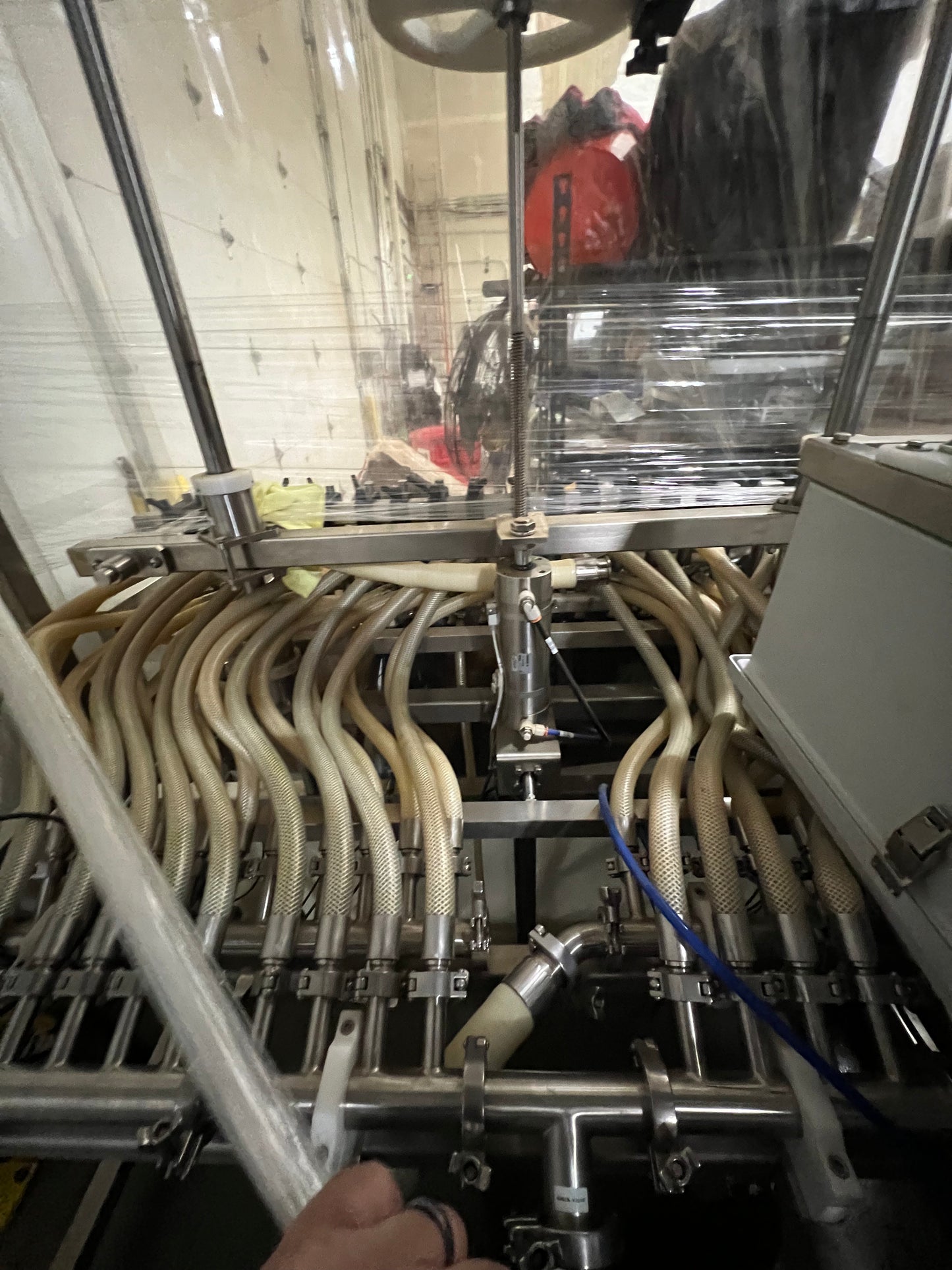 Slightly Used Inline Filling Systems - Overflow Filler - 16-20 Head Pressure overflow hot filler, with feed tank, Serial # 46910, 220 Volt