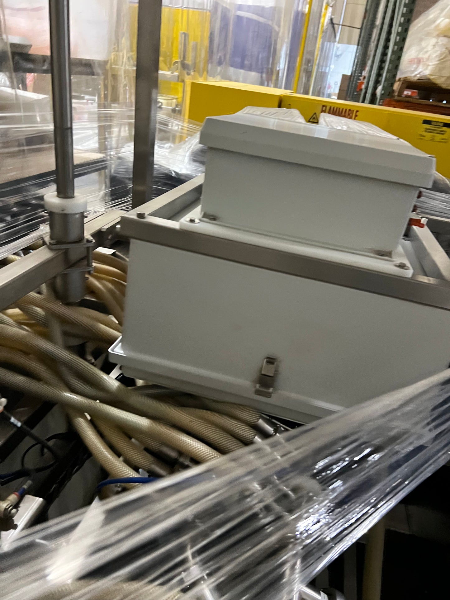 Slightly Used Inline Filling Systems - Overflow Filler - 16-20 Head Pressure overflow hot filler, with feed tank, Serial # 46910, 220 Volt