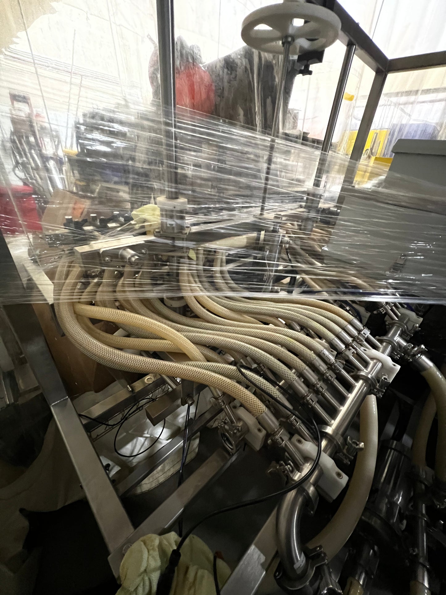 Slightly Used Inline Filling Systems - Overflow Filler - 16-20 Head Pressure overflow hot filler, with feed tank, Serial # 46910, 220 Volt