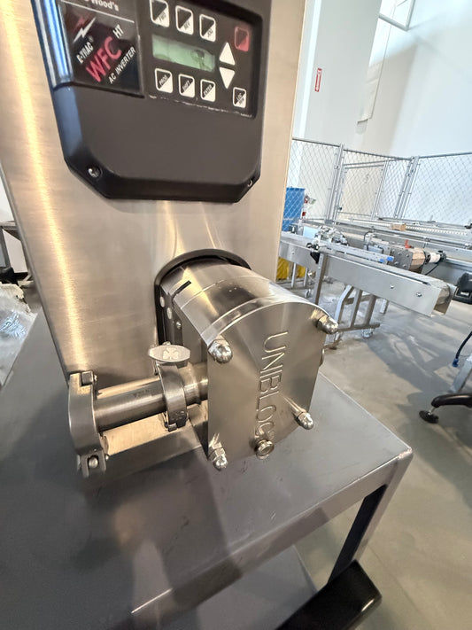 Pre-Owned Unibloc PD Pump Model Labtop 400-450, TC Ports, On Casters with Plug, VFD