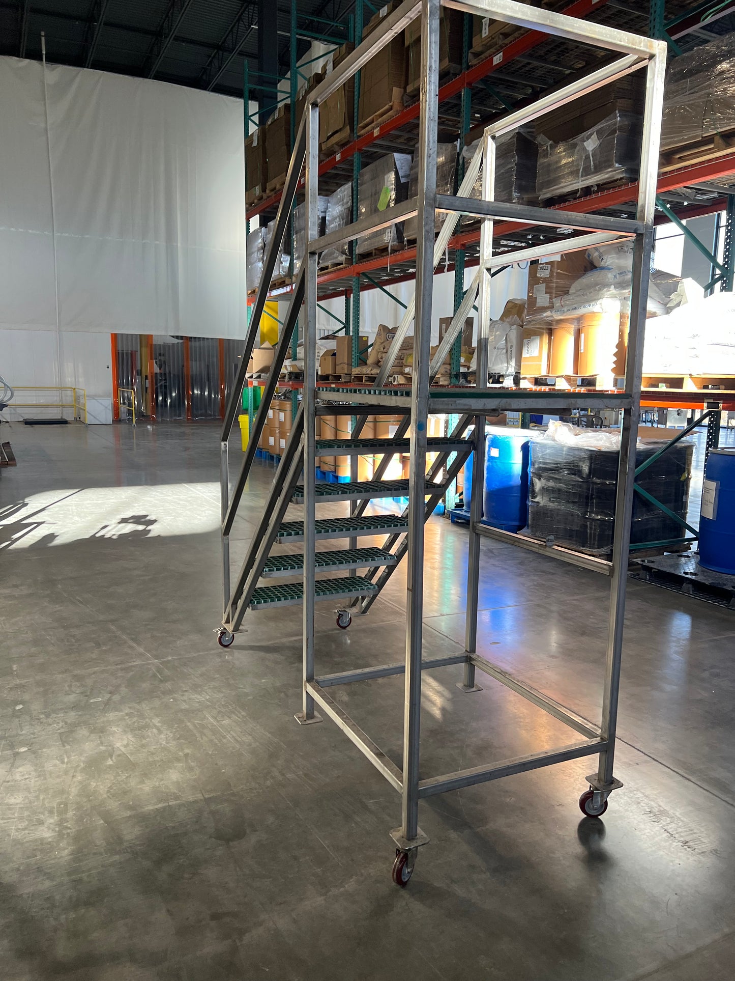 Pre-Owned / Minimal Use, SS Platform with stairs - currently mounted on SS Temporary casters