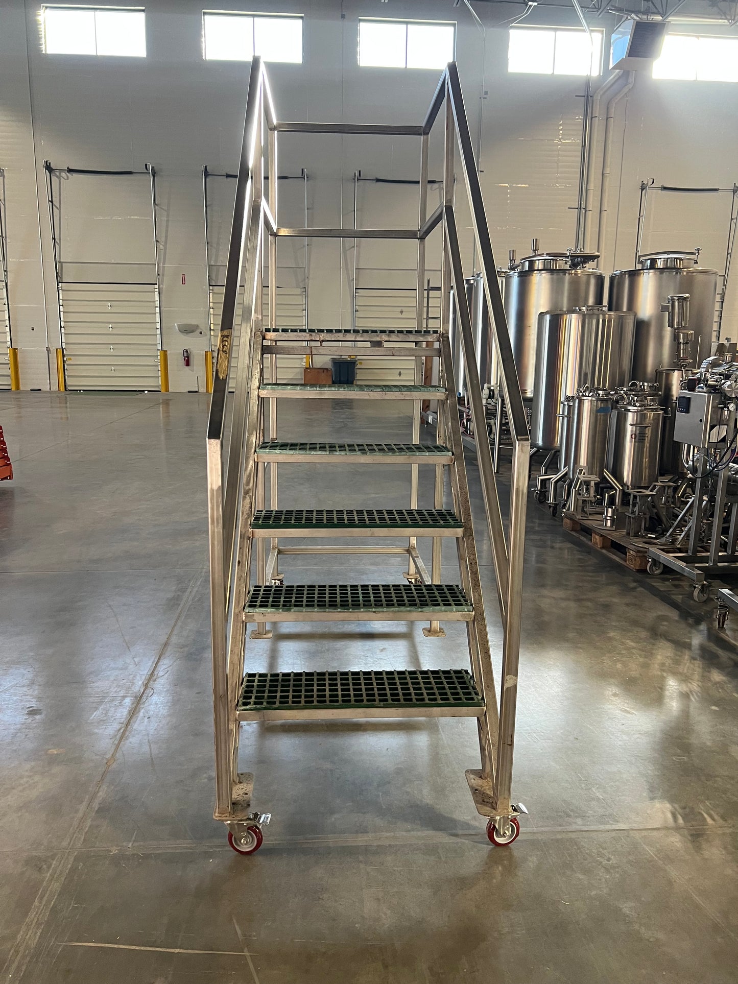 Pre-Owned / Minimal Use, SS Platform with stairs - currently mounted on SS Temporary casters