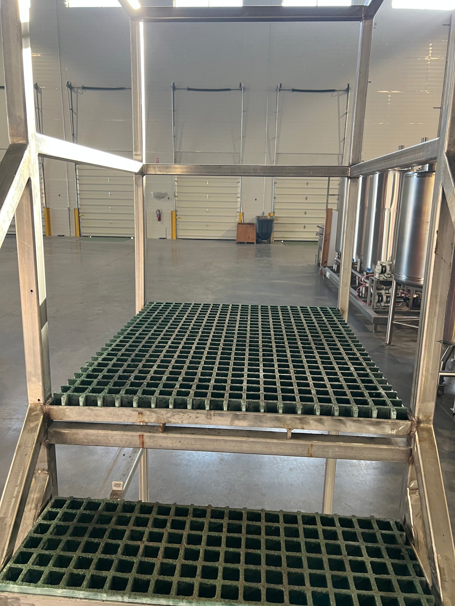 Pre-Owned / Minimal Use, SS Platform with stairs - currently mounted on SS Temporary casters