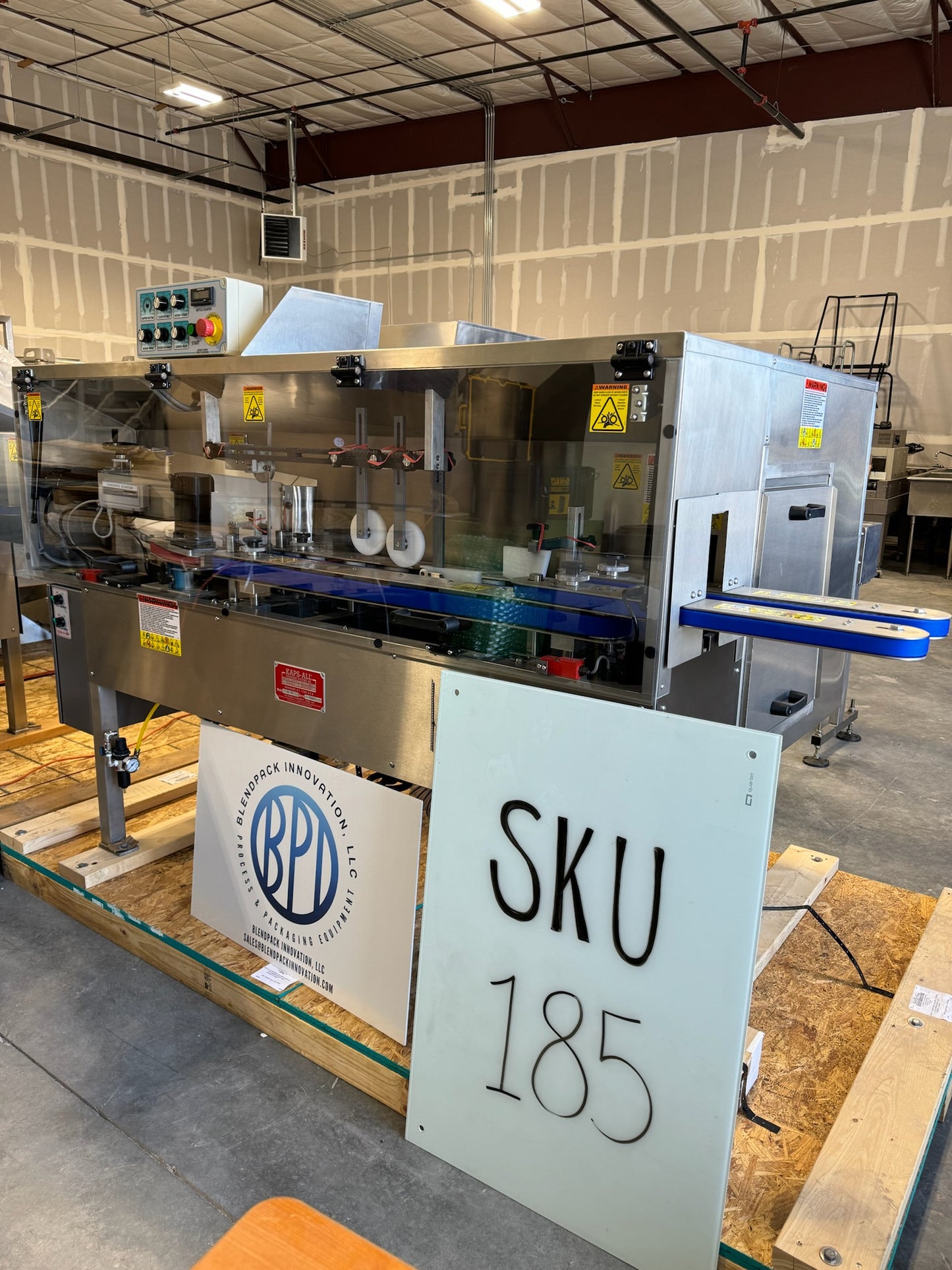 Kaps-All Model AU-3 Bottle Unscrambler / Cleaner, NEW 30" prefeed elevator and 20 cubic ft hopper