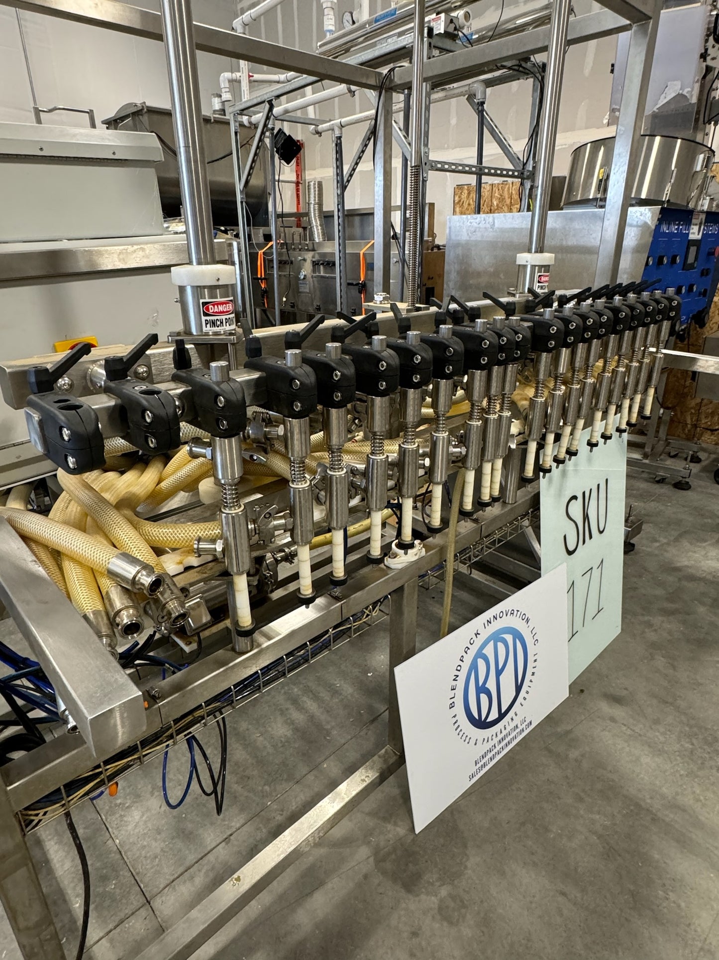 Slightly Used Inline Filling Systems - Overflow Filler - 16-20 Head Pressure overflow hot filler, with feed tank, Serial # 46910, 220 Volt