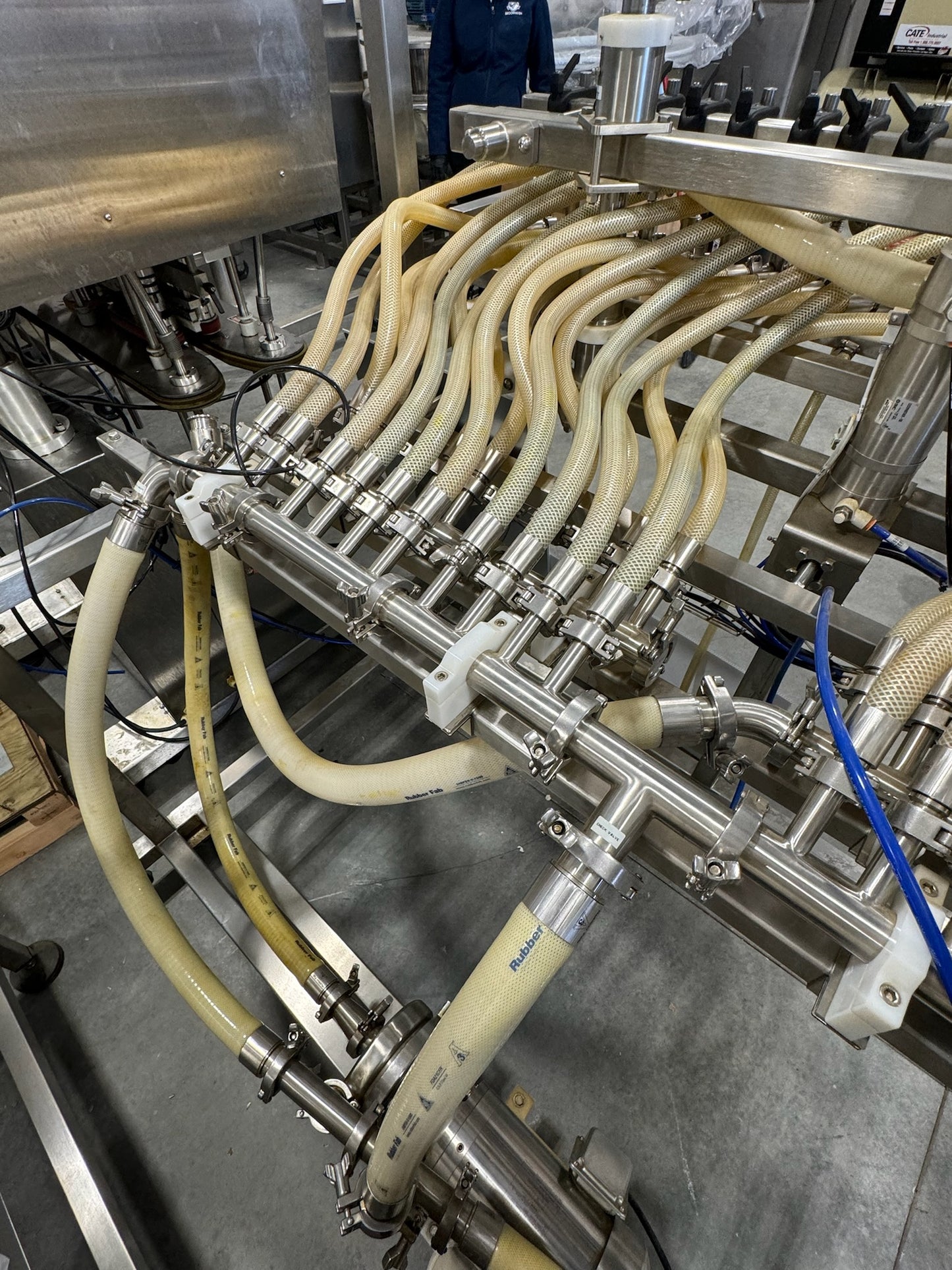 Slightly Used Inline Filling Systems - Overflow Filler - 16-20 Head Pressure overflow hot filler, with feed tank, Serial # 46910, 220 Volt