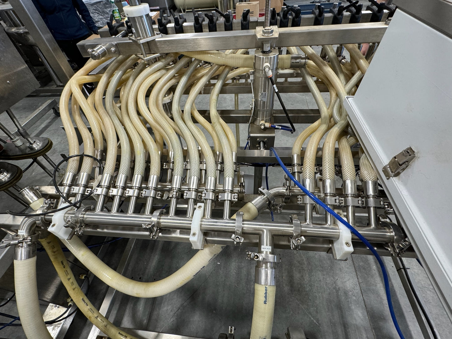 Slightly Used Inline Filling Systems - Overflow Filler - 16-20 Head Pressure overflow hot filler, with feed tank, Serial # 46910, 220 Volt