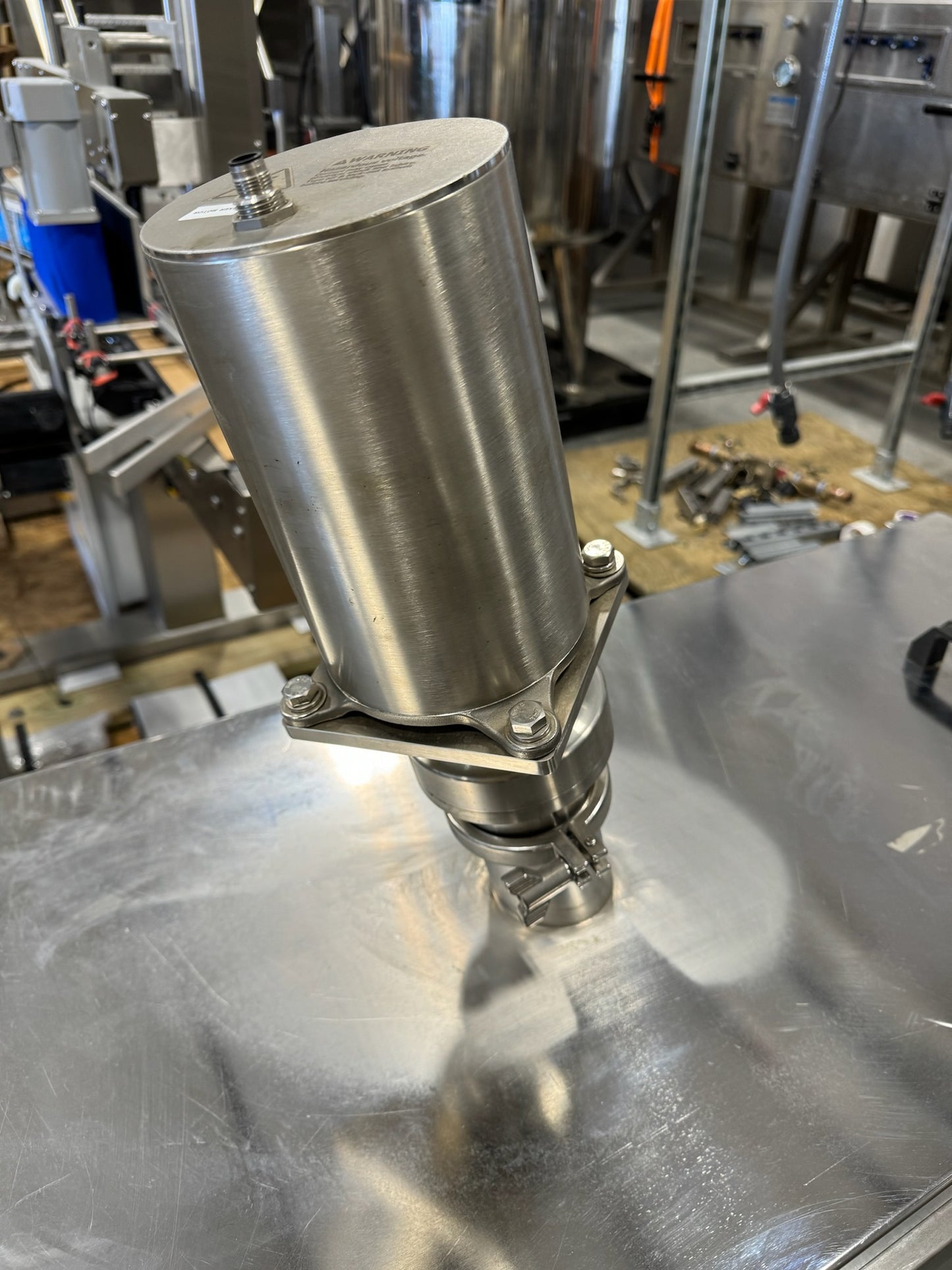 Slightly Used Inline Filling Systems - Overflow Filler - 16-20 Head Pressure overflow hot filler, with feed tank, Serial # 46910, 220 Volt